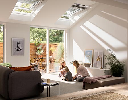 Mother and child playing in living room